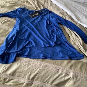 Very pretty Michael Tyler made in Canada royal blue top with lots of styling.